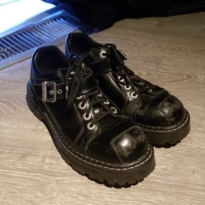 Black leather buckle shoes